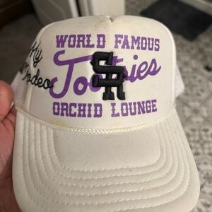 Stevenson Ranch “Not My First Rodeo” White and Purple Tootsies trucker hat